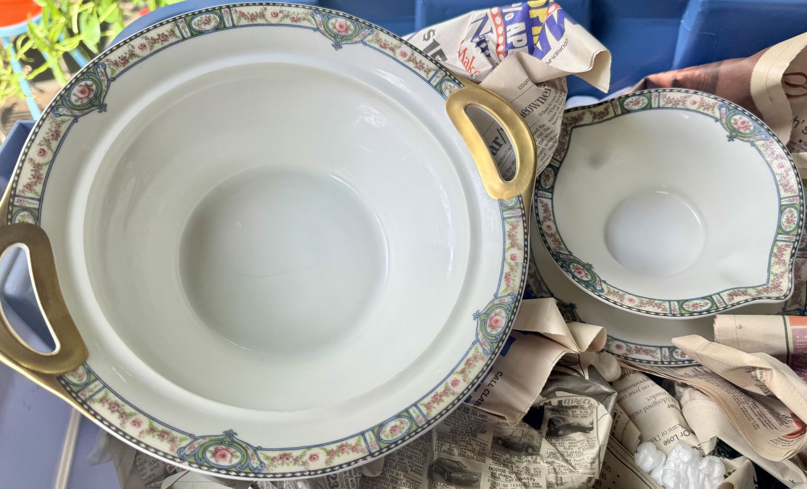 Floral and gilt-handled china serving bowl and saucer set
